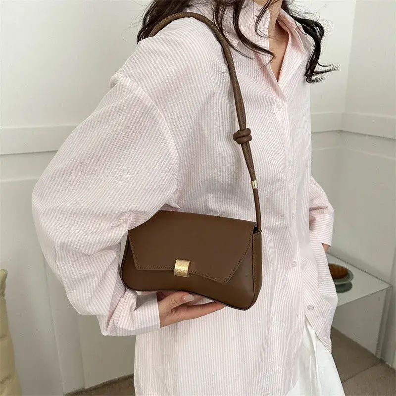 Senior handbag women's new baguette bag retro hand-held underarm bag Foreign style young woman single shoulder crossbody bag