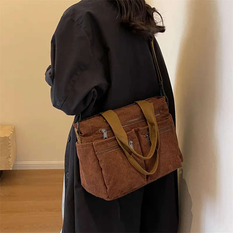 Velvet shoulder bag Large capacity commuter travel fashion casual simple crossbody bag Korean version Rui Ying wind backpack