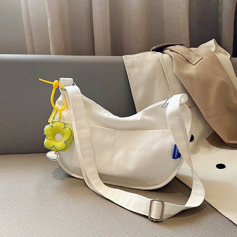 Large capacity canvas dumpling bag female Japanese new all-in-one shoulder bag Fashion flower postman bag crossbody bag