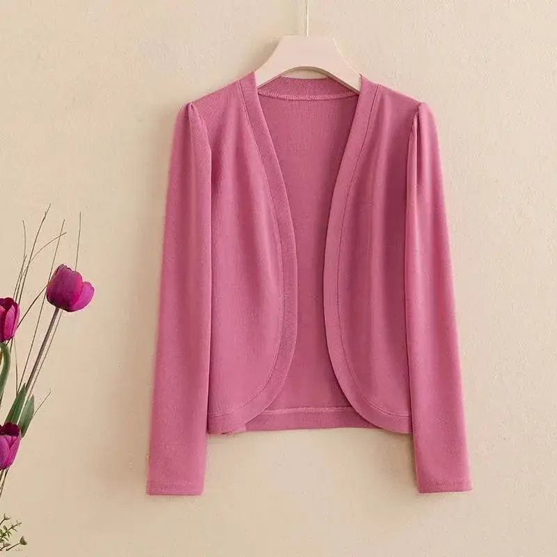 solid-color ice silk cardigan with shawl and anti-sun shoulder pads is fashionable and versatile, showing  white cardigan