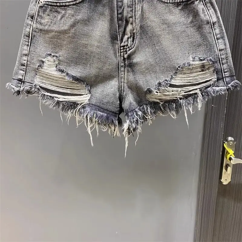 Worn Legs with Rough Edges Washed Black Denim Shorts 2025 Summer New Women Fashion A-line Wide Leg Hole Ripped Denim Shorts