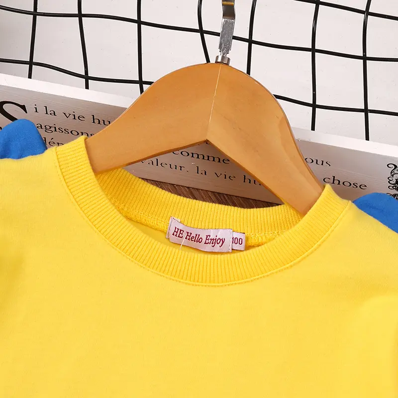 Unisex Playful Cartoon Little Dino Yellow Long Sleeve T-Shirt Spring-Fall Casual Cute Base Layer Top for Everyday Wear