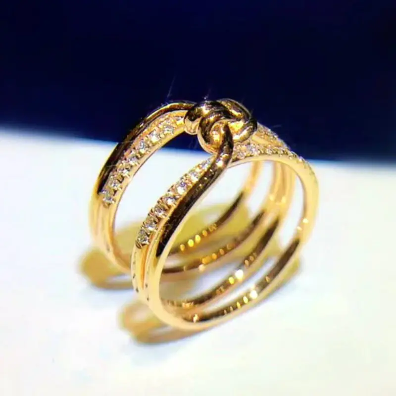 Huitan Creative Knot Design Women Finger Rings Gold Color Temperament Female Accessory with Dazzling CZ Party Statement Jewelry