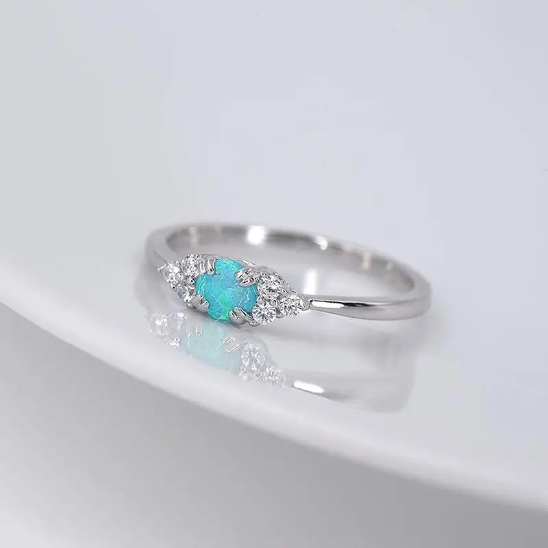 Huitan Round Blue Imitation Opal Ring Elegant Women Exquisite Wedding Band Shiny Zirconia Finger Jewelry for Engagement Ceremony