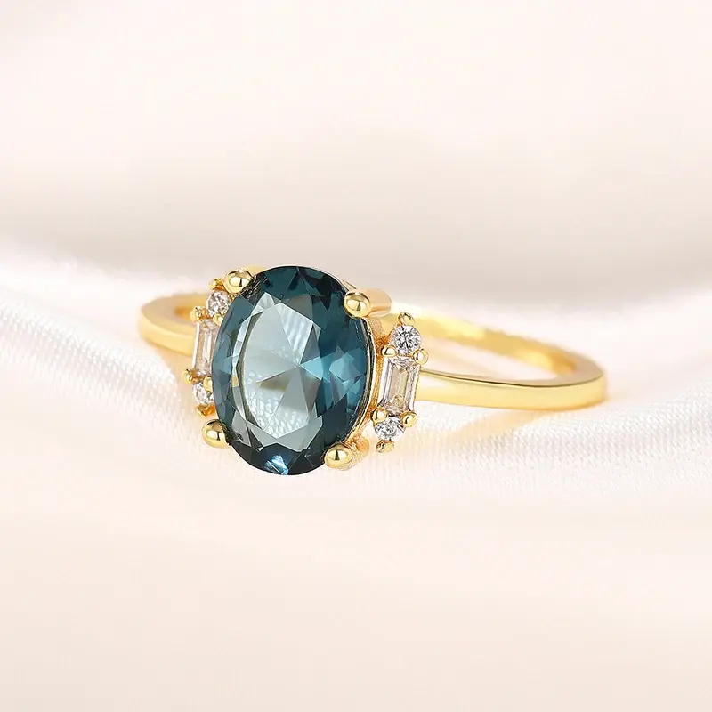 Huitan Graceful Oval Blue Cubic Zirconia Gold Color Women Rings Anniversary Party Elegant Lady Rings Fancy Gift Fashion Jewelry
