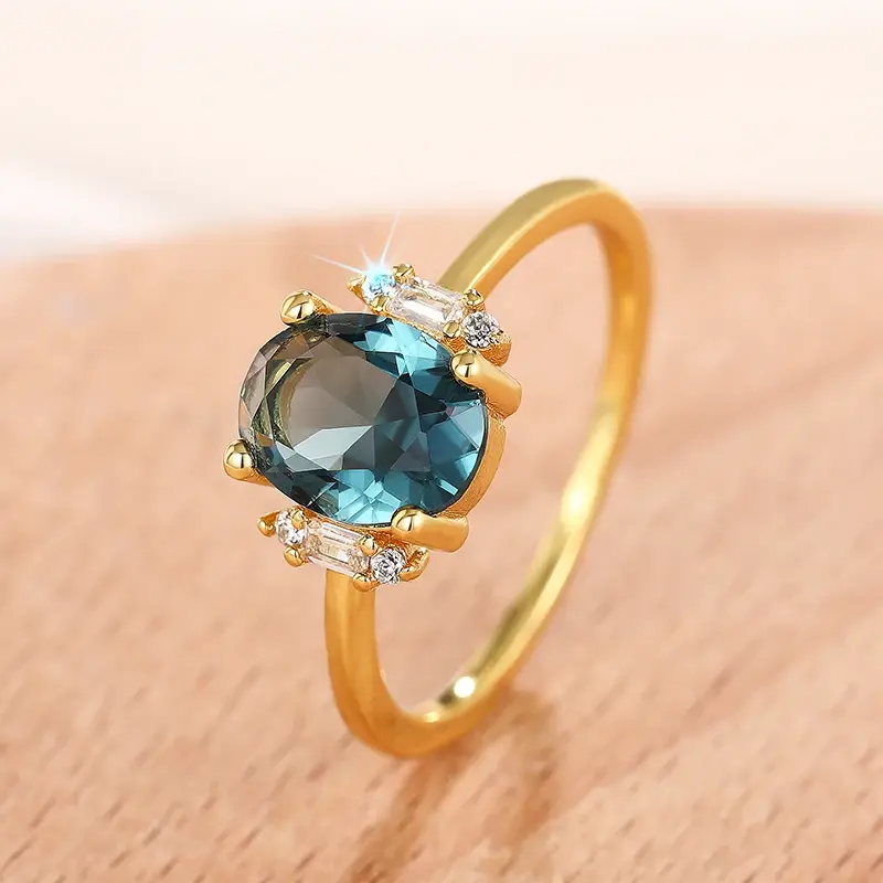 Huitan Graceful Oval Blue Cubic Zirconia Gold Color Women Rings Anniversary Party Elegant Lady Rings Fancy Gift Fashion Jewelry