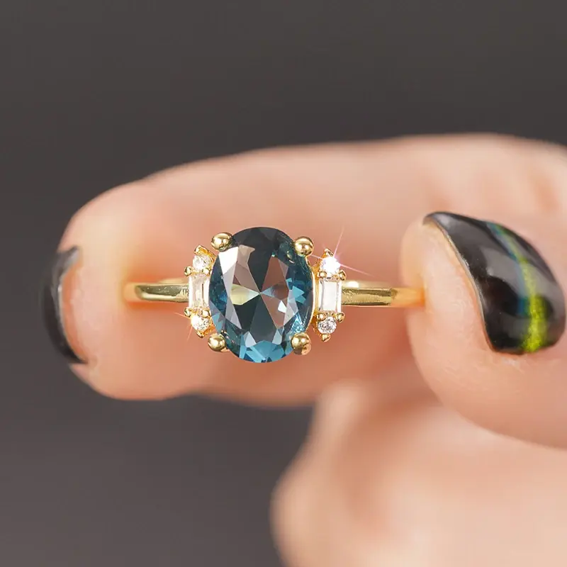 Huitan Graceful Oval Blue Cubic Zirconia Gold Color Women Rings Anniversary Party Elegant Lady Rings Fancy Gift Fashion Jewelry