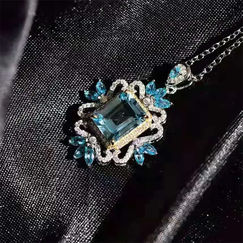 Huitan Bohemia Style Blue Cubic Zirconia Pendant Necklace for Women Hollow Out Flower Design Temperament Wedding Party Jewelry