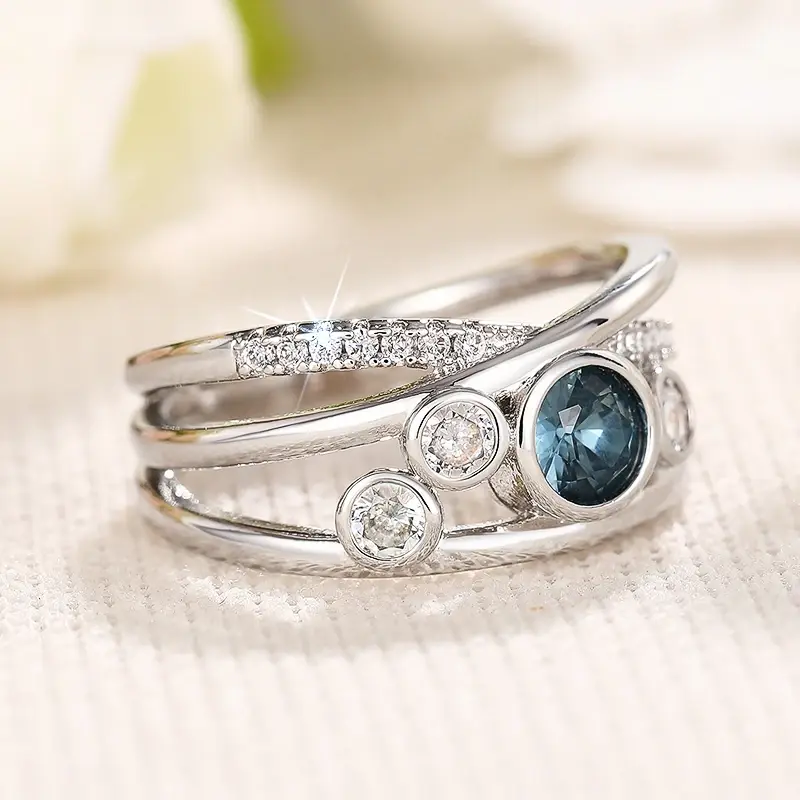 Huitan Trendy Cross Silver Color Finger Ring Female Shiny Blue Zirconia Accessories for Engagement Party Fashion Jewelry Gift