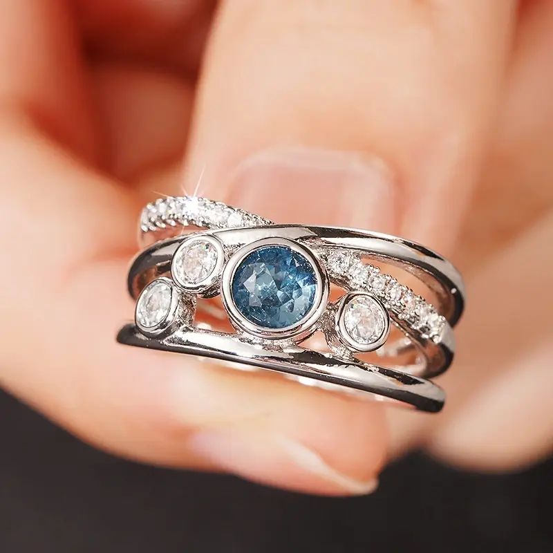 Huitan Trendy Cross Silver Color Finger Ring Female Shiny Blue Zirconia Accessories for Engagement Party Fashion Jewelry Gift
