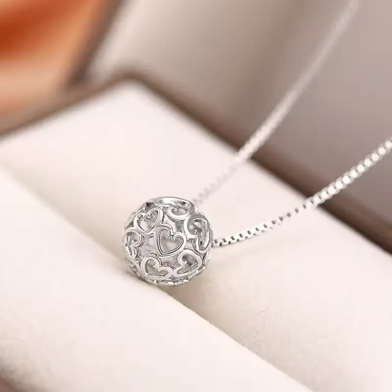 Huitan Trendy Lady Dainty Pendant Necklace Hollow-out Heart Hollow Ball Accessories Graceful Silver Color Jewelry for Engagement
