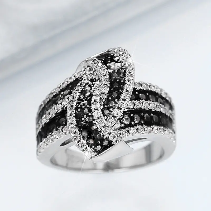 Huitan Personality Black Enamel Knot Ring for Women New Modern Design Chic Female Finger Ring Party Bling CZ Statement Jewelry