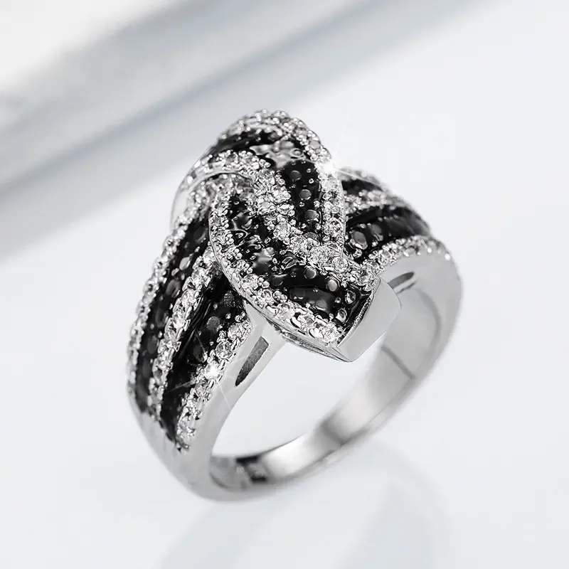 Huitan Personality Black Enamel Knot Ring for Women New Modern Design Chic Female Finger Ring Party Bling CZ Statement Jewelry