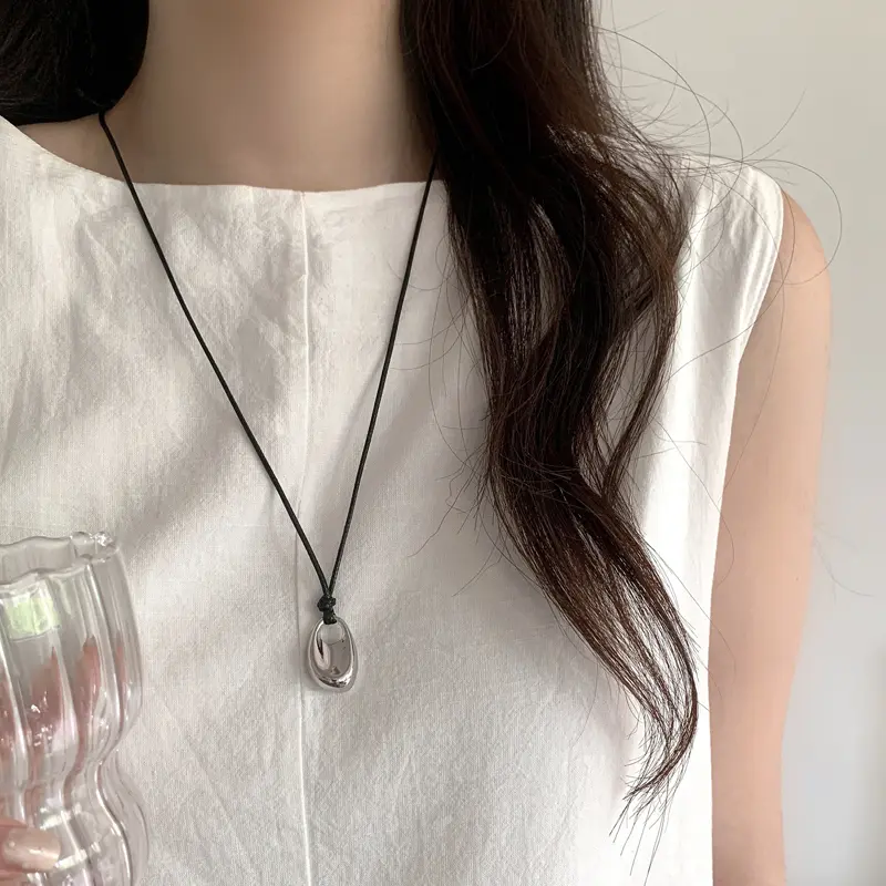 Korean Metal Bean Hollow Pendant Necklace for Women Simple Black Long Leather Rope Clavicle Chain Sweater Chain Jewelry Gift