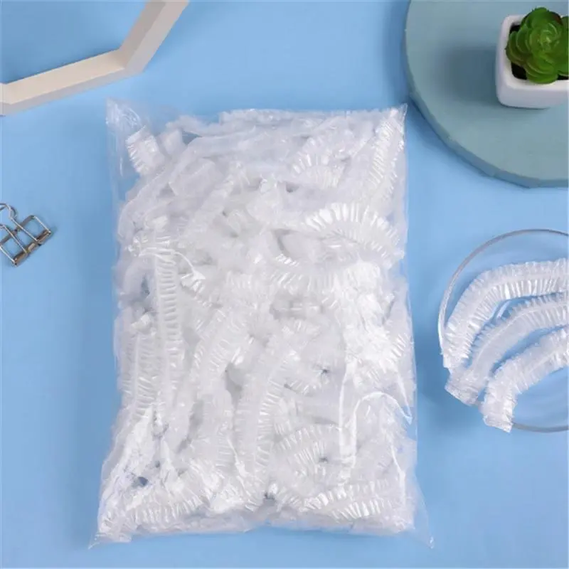 2025 New Practical 100Pcs Shower Cap Elastic Mesh Shape Waterproof Non-woven Bath Hat for Extension Clear Beauty Hair
