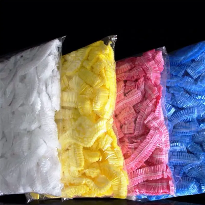 2025 New Practical 100Pcs Shower Cap Elastic Mesh Shape Waterproof Non-woven Bath Hat for Extension Clear Beauty Hair