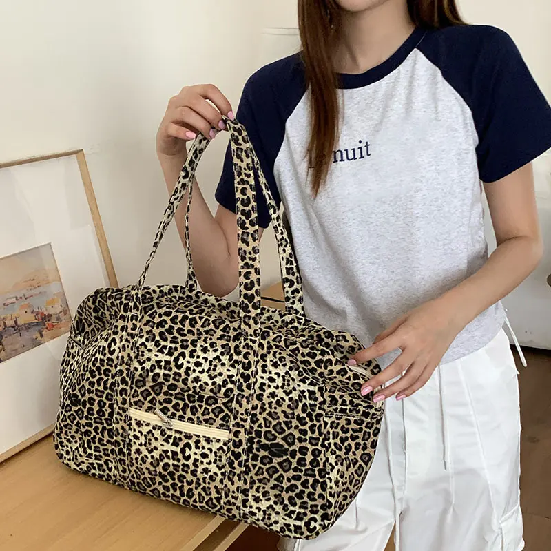 A Niche Leopard Print Canvas Handbag Highend Leopard Print Commuter Shoulder Bag Cross border Large Capacity Business Travel Bag