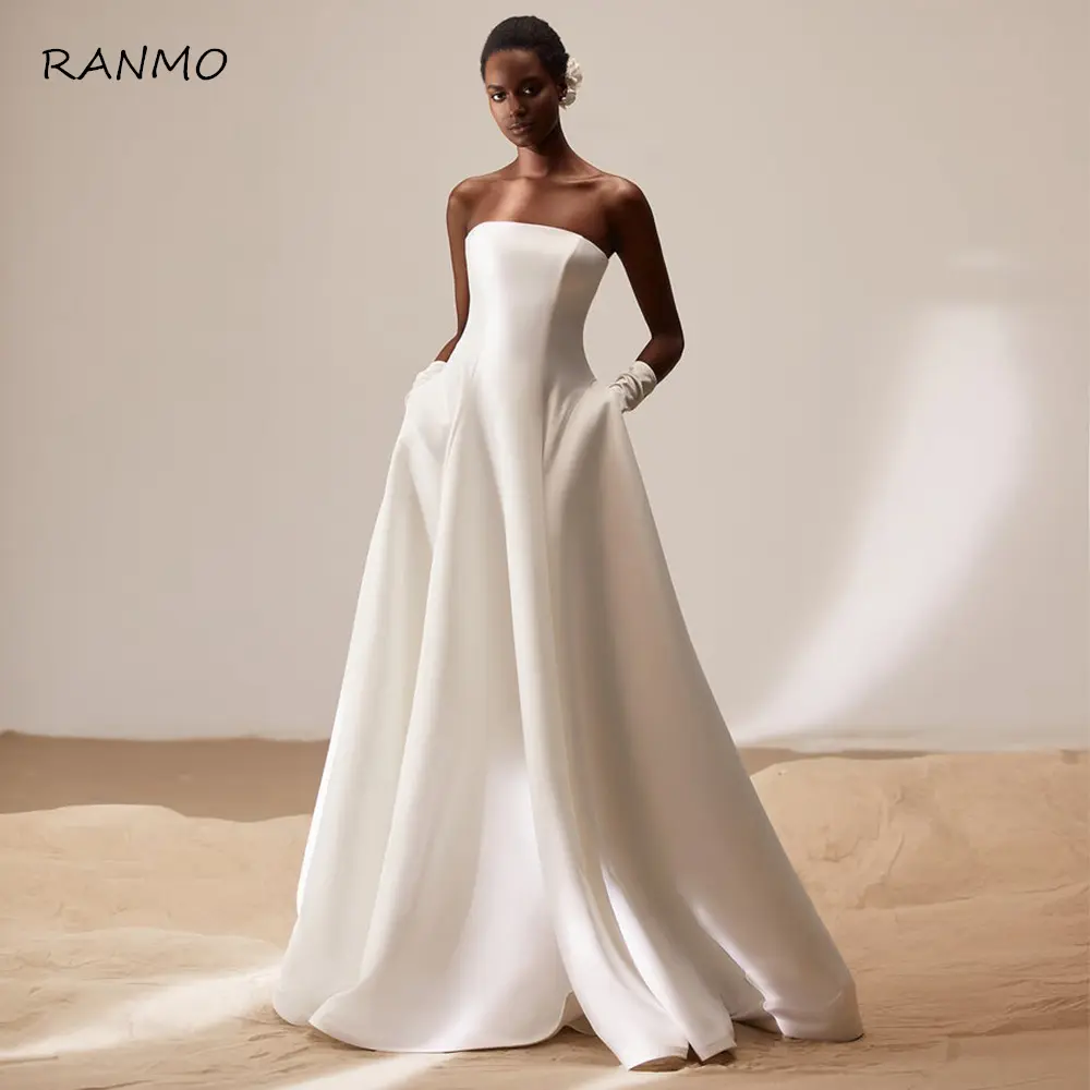 Simple Wedding Dress Ivory Stain Strapless A Line Modern Wedding Gowns for Women 2023 Bride Pockets Lace Up Backless Brial Dress