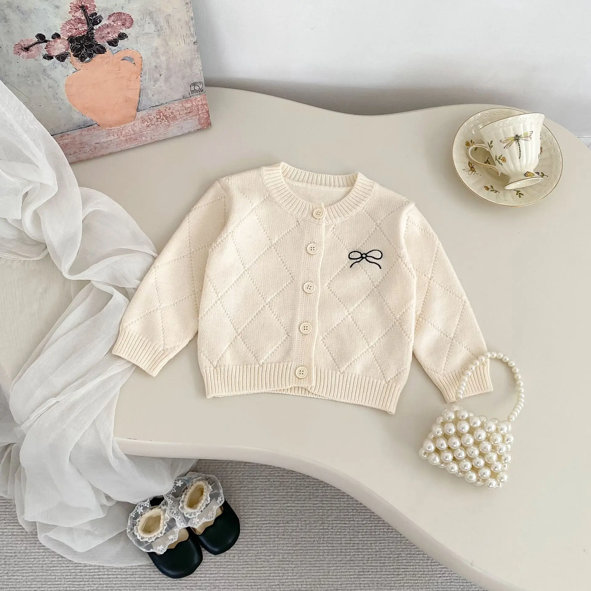 2025 Autumn New Baby Knitted Coat Female Baby Western Bow Sweater Cardigan Flared Pants Two-piece Set