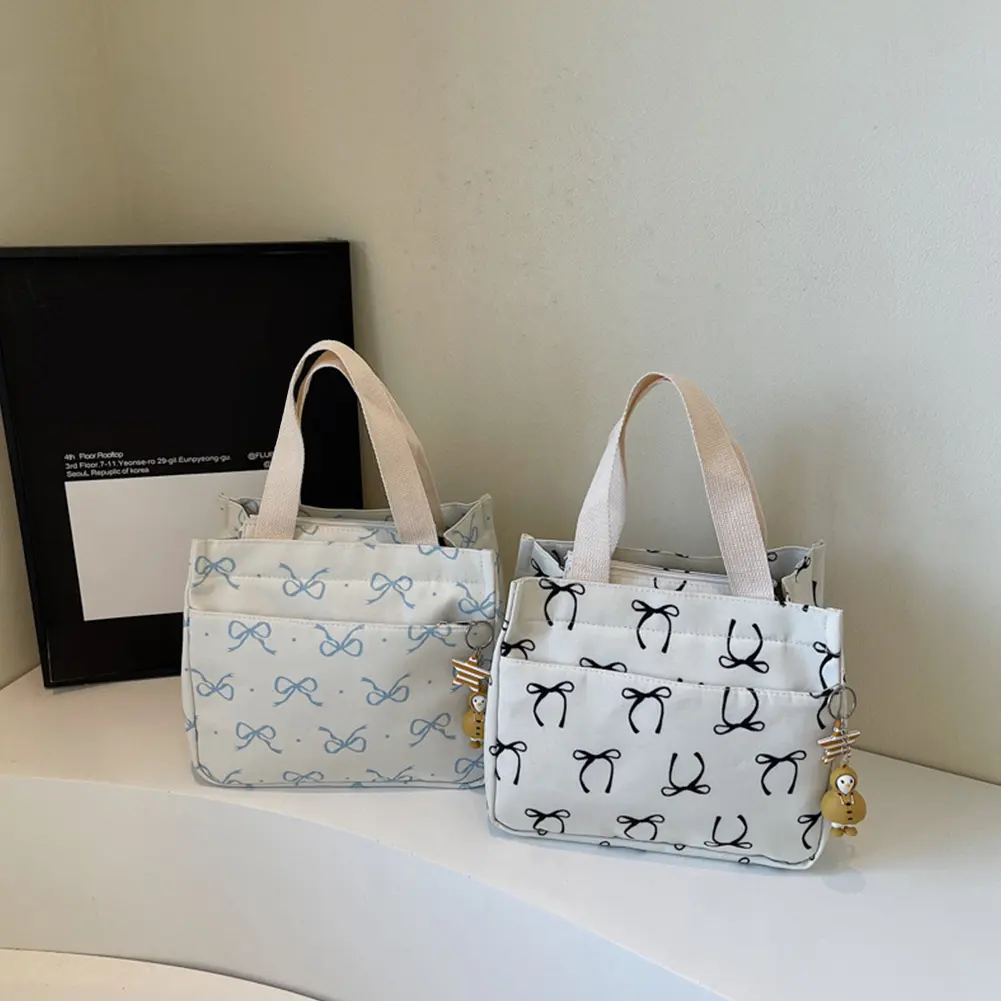 New Fashion Casual Handbag Lightweight Bow Print Canvas Lunch Bag with Cute Pendant Korean Style Large Capacity Commuter Bag