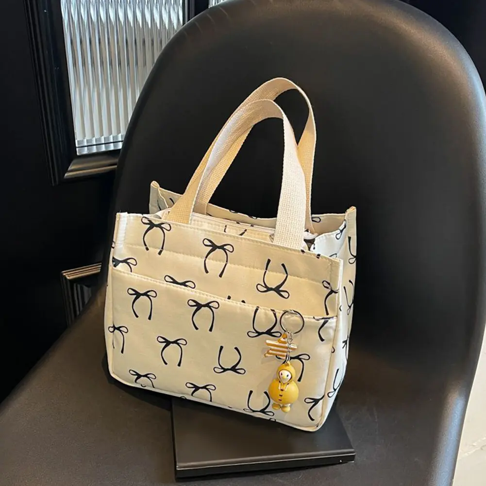 New Fashion Casual Handbag Lightweight Bow Print Canvas Lunch Bag with Cute Pendant Korean Style Large Capacity Commuter Bag