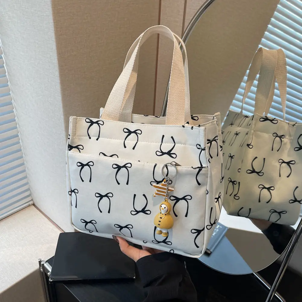 New Fashion Casual Handbag Lightweight Bow Print Canvas Lunch Bag with Cute Pendant Korean Style Large Capacity Commuter Bag