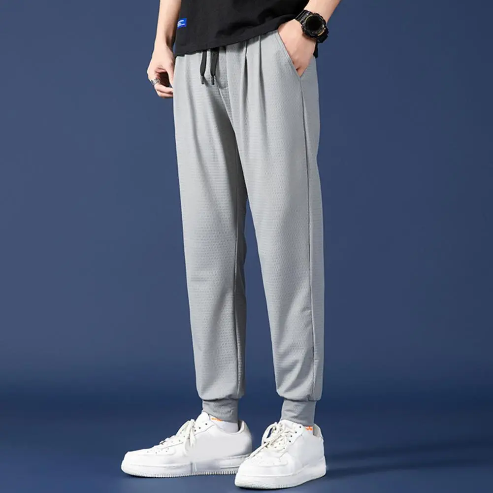 Mid-rise Elastic Waistband Casual Pants Drawstring Pockets Mesh Men Ice Silk Thin Jogging Sweatpants Street Running Sport Pants