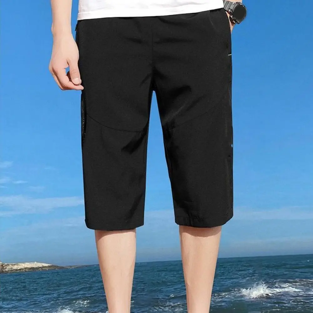 2025 XL-5XL Men Cropped Pants Elastic Waist Loose Ice Silk Zipper Pockets Loose Fit Cropped Pants Men Mid-calf Length Trousers