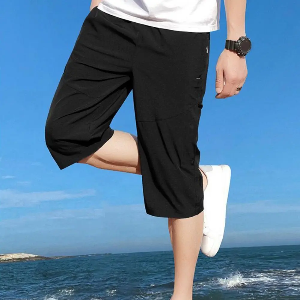 2025 XL-5XL Men Cropped Pants Elastic Waist Loose Ice Silk Zipper Pockets Loose Fit Cropped Pants Men Mid-calf Length Trousers
