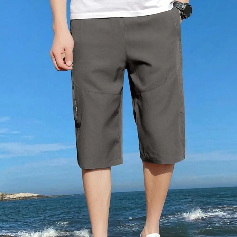 2025 XL-5XL Men Cropped Pants Elastic Waist Loose Ice Silk Zipper Pockets Loose Fit Cropped Pants Men Mid-calf Length Trousers
