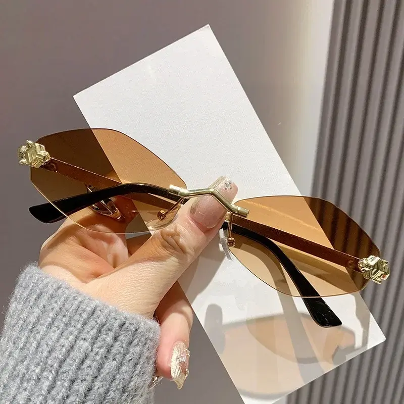 New High Quality Fashion Sunglasses Women Retro Metal Small Diamond Frame Vintage Luxury Rhombus Rimless Shades Men Glasses
