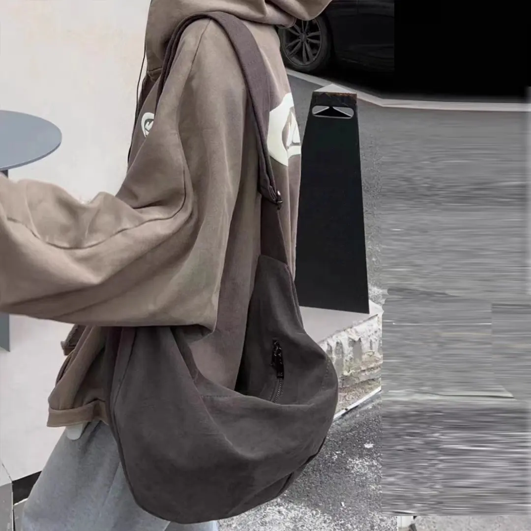 Vintage 2025 new canvas dumpling bag for women large slung single shoulder bag wide shoulder band for couples dormitory lazy bag