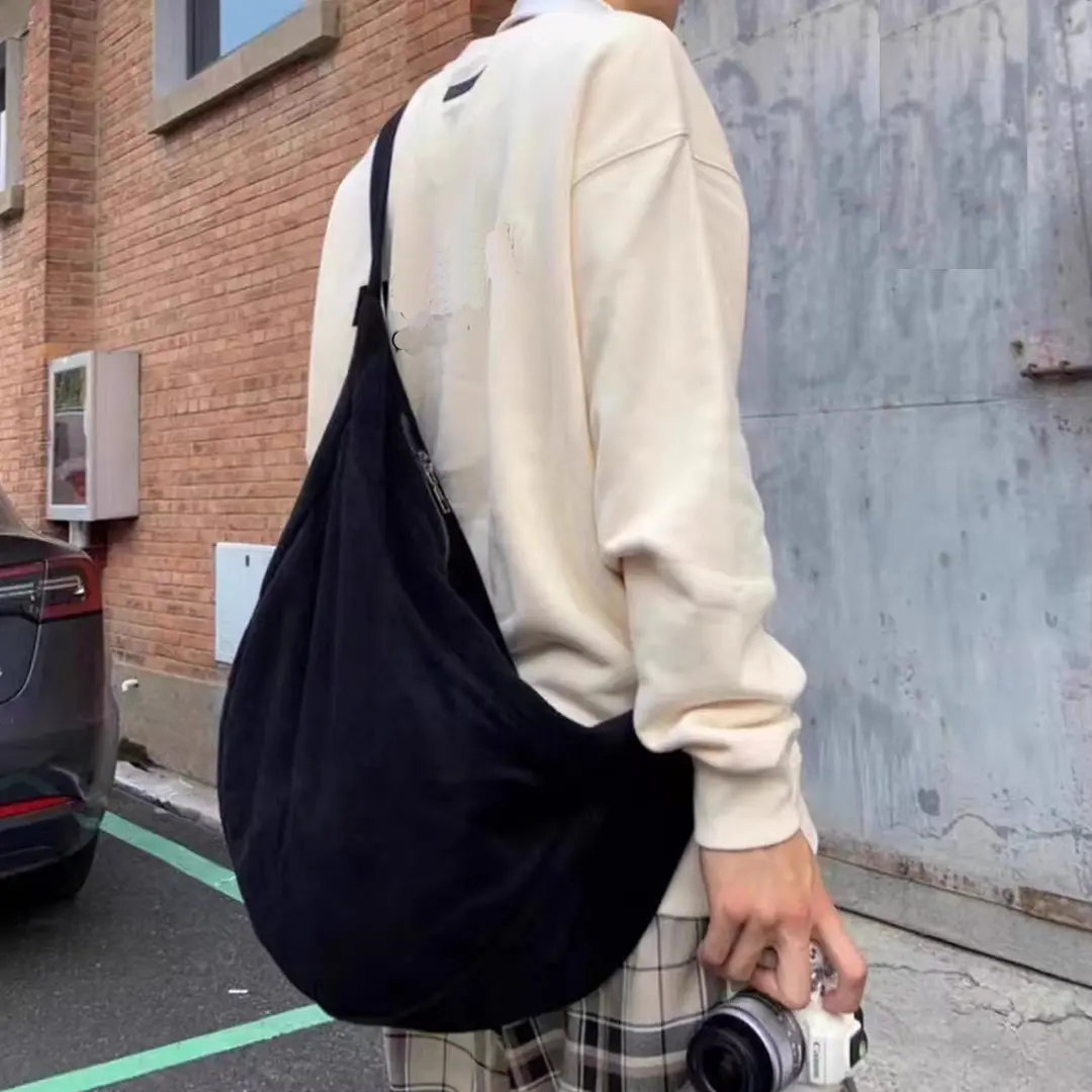 Vintage 2025 new canvas dumpling bag for women large slung single shoulder bag wide shoulder band for couples dormitory lazy bag