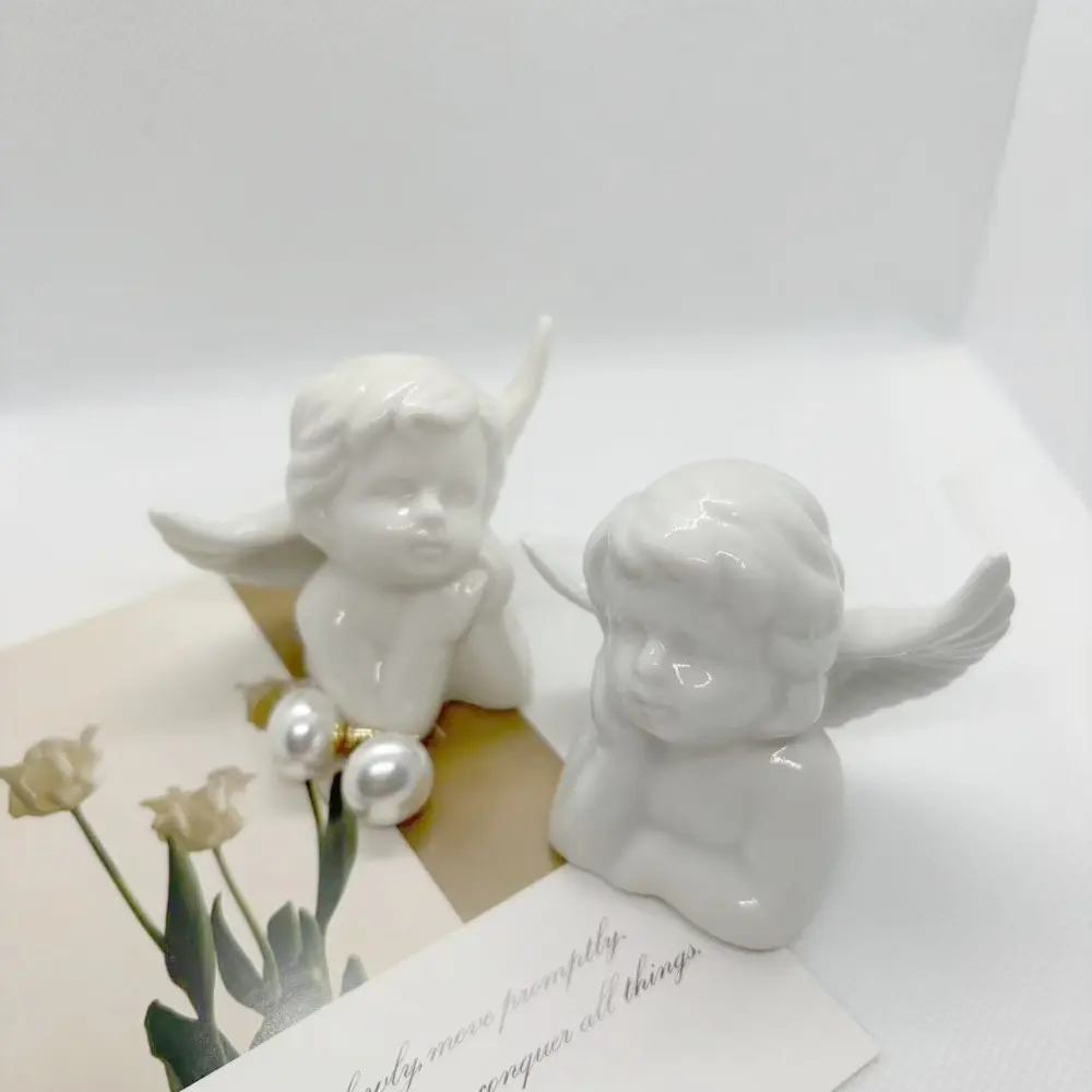 Modern Angel Fairy Figurines Fun Crafts Atmosphere Angel Statues Sculpture Pure white Ceramic Angel Ornamen Living Room Desktop
