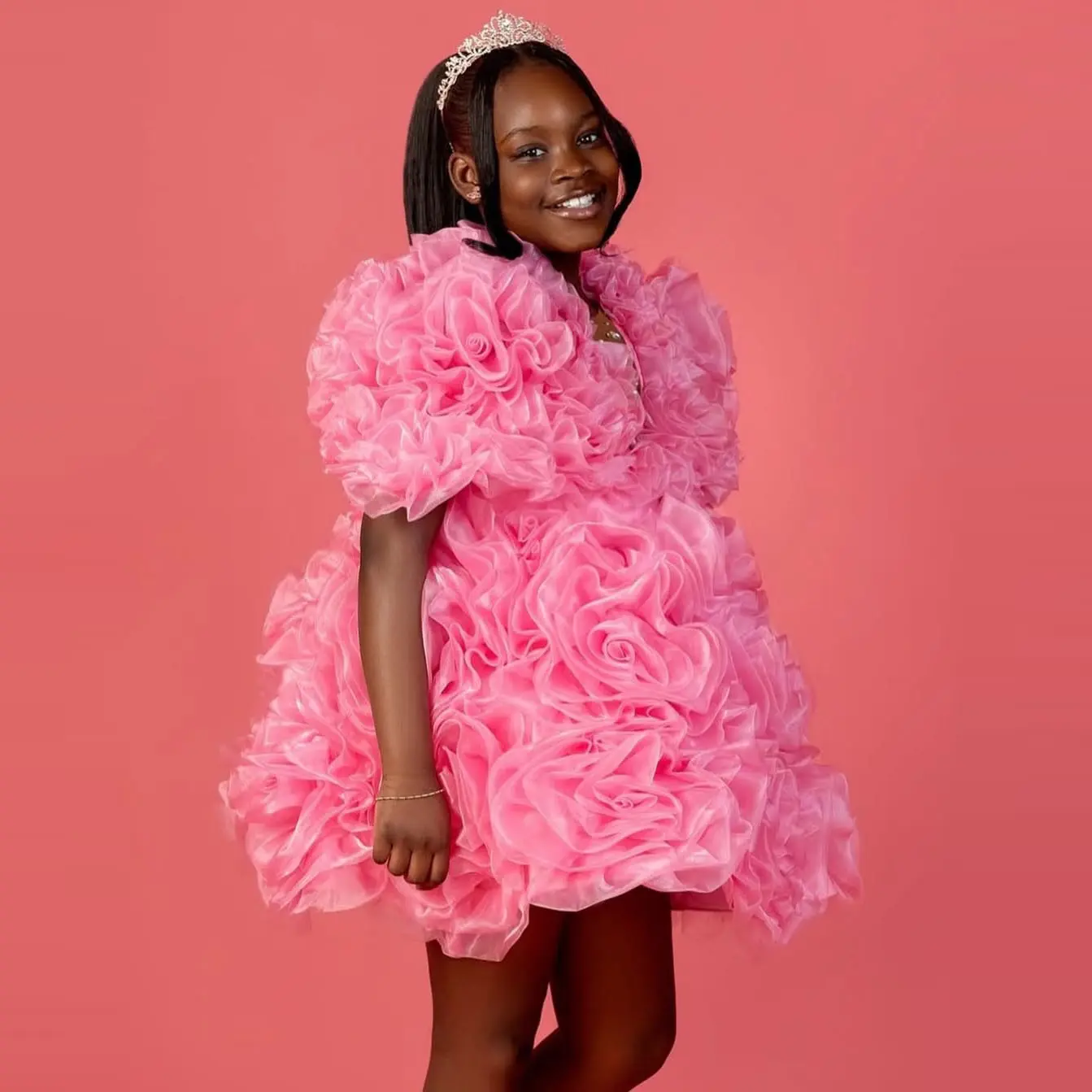 Charming Pink Flower Girl Dress for Kids Made of Tulle with Ruffled Layers and Crown Perfect for Weddings and Special Occasions