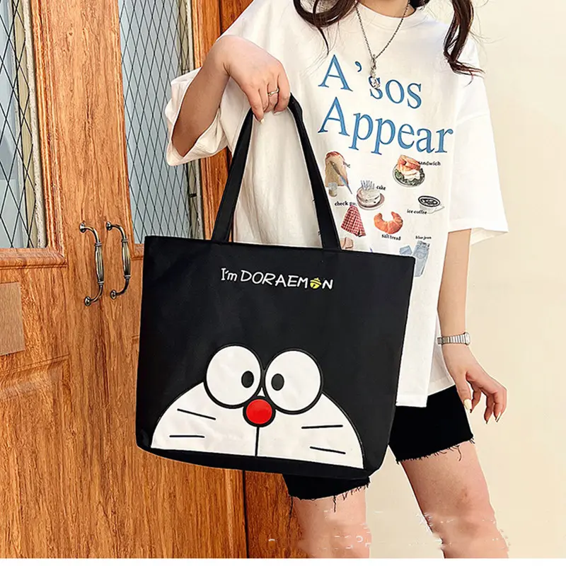 40cm kids canvas cartoon fashion High capacity boy handbag Doraemon girl women cute shoulder bag Travel shopping storage bag