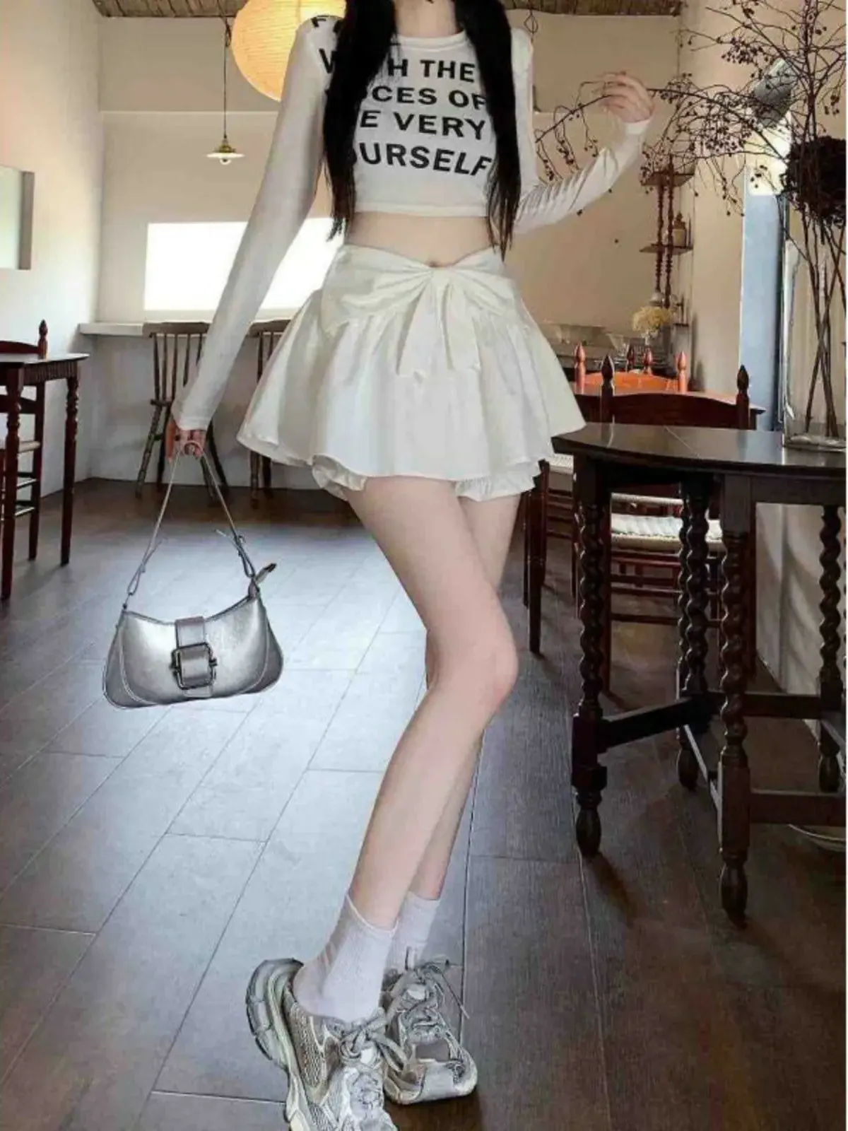Whitebow High-Waisted A- Line Mini Skirt For Women Summer 2023 Anti-Exposure Short Length Trendy Female Loose Skirt