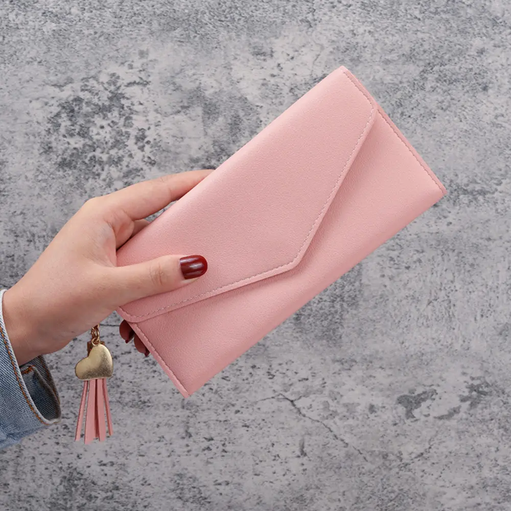 New tassel pendant women's wallet, long fashionable coin purse, Korean version cute student zipper card bag and coin bag