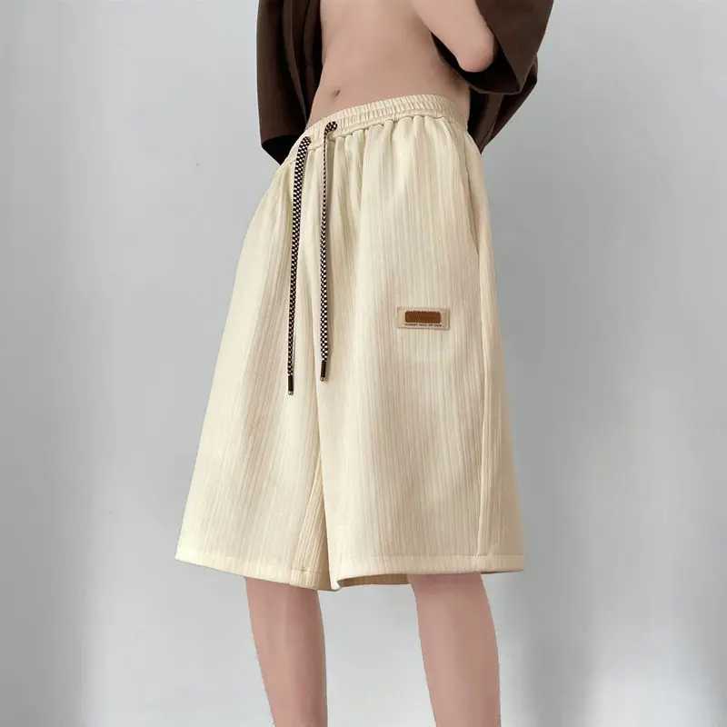 Casual pleated ice silk shorts for men in summer, thin and quick drying beach pants, loose pants for sports and leisure